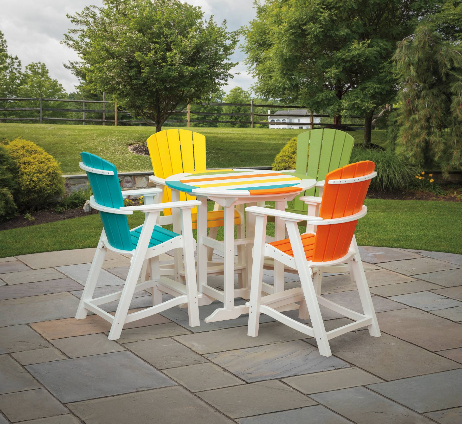 multi-colored polywood balcony chairs and round table